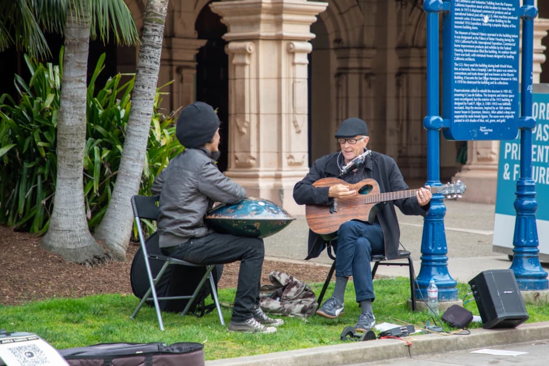 Two street musicians in Balboa Park playing music