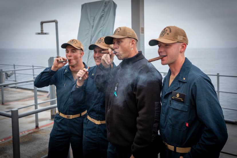 Midshipmen and Chaps while smoking cigars