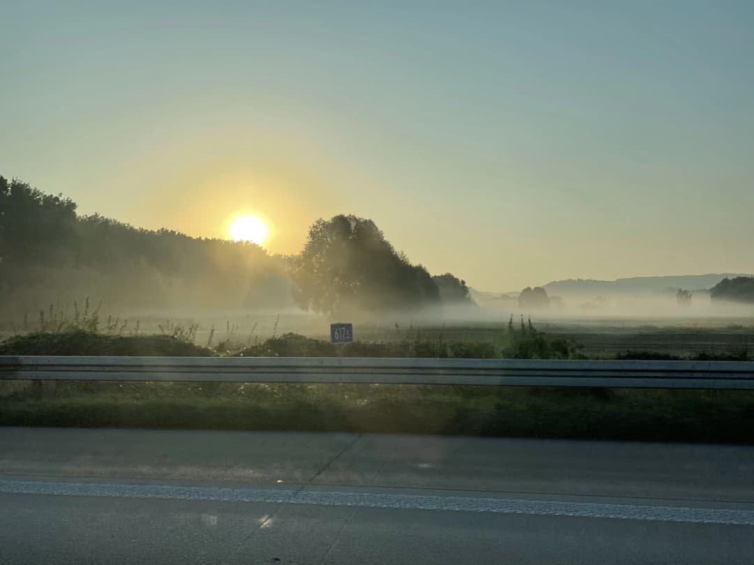 Foggy sunrise over German field